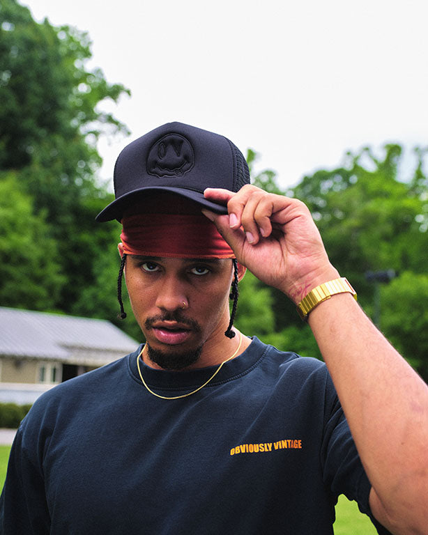 Melting Smiley Face Trucker Hat